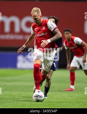 Braga, Guimaraes, Portogallo. 29 marzo 2025. URUS RACIC del SC Braga visto in azione durante la Liga Portugal Betclic 2024/25 match tra SC Braga e FC Arouca al EstÃ¡dio Municipal de Braga il 29 marzo 2025 a Braga, Portogallo. Punteggio finale SC Braga 2 - 1 FC Arouca (immagine di credito: © Miguel Lemos/ZUMA Press Wire) SOLO PER USO EDITORIALE! Non per USO commerciale! Crediti: ZUMA Press, Inc./Alamy Live News Foto Stock