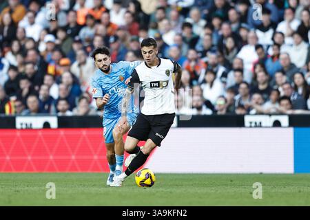 Valencia, Spagna. 30 marzo 2025. Enzo Barrenechea (Valencia) calcio: Partita spagnola "LaLiga EA Sports" tra Valencia CF 1-0 RCD Mallorca all'Estadio de Mestalla di Valencia, Spagna. Crediti: Mutsu Kawamori/AFLO/Alamy Live News Foto Stock