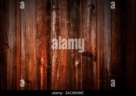Fondo in legno con vecchie tavole scure rustiche come texture Foto Stock