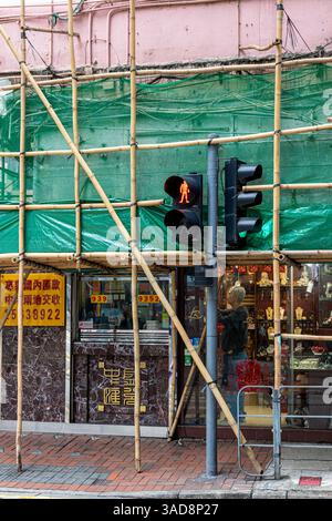 Bambù utilizzato per impalcare su un edificio a Marble Road, Hong Kong Island, Hong Kong, Cina Foto Stock
