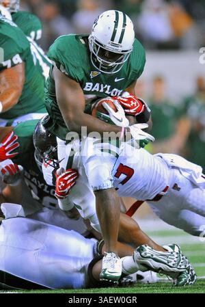 26 novembre 2011: . Il running back dei Baylor Bears Terrance Ganaway (24) porta la palla durante la partita tra i Texas Tech Red Raiders e i Baylor Bears al Cowboy Stadium di Arlington Texas..Baylor vince 66-42..Manny Flores/CSM(Credit Image: Â© Manny Flores/Cal Sport Media/ZUMAPRESS.com) Foto Stock