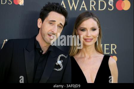 Adrien Brody e Georgina Chapman partecipano agli Olivier Awards 2025 alla Royal Albert Hall di Londra, Inghilterra. Foto Stock