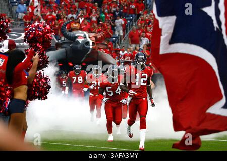 27 settembre 2009: Gli Houston Texans entrano in campo tra fumo e testa rossa di tori del diavolo. I Jaguars sconfissero i Texans 31-24 al Reliant Stadium di Houston TX (Credit Image: SGM/ZUMAPRESS.com) Foto Stock