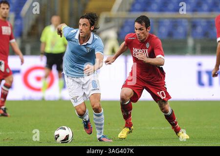 26 settembre 2012 - Roma, Italia - Mauri e D'Agostino. SS Lazio vs AC Siena gara del campionato di calcio di serie A TIM disputata all'Olimpico di Roma. (Immagine di credito: © Gilberto Carbonari/ZUMAPRESS.com) Foto Stock