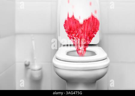 Un simbolo di amore rovinato, tradimento, separazione e relazioni viziate - il cuore come simbolo dell'amore scorre giù per il bagno. Una foto concettuale Foto Stock