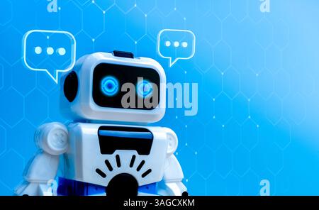 AI bot, concetto tecnologico di assistente di intelligenza artificiale. Robot carino e intelligente bianco con bolla vocale su sfondo blu della rete con c Foto Stock