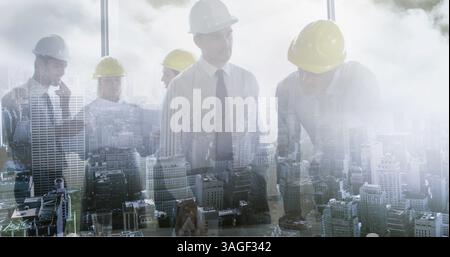 Immagine di un gruppo di architetti che lavorano insieme sul paesaggio urbano Foto Stock