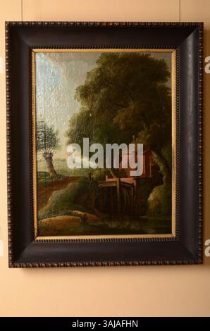 Anonimo dipinto paesaggistico olandese intitolato "Landschap met watermolen", dipinto nel 1662. L'olio su tela raffigura un paesaggio con un mulino ad acqua, parte della collezione del Museo Stedelijk Alkmaar. Foto Stock