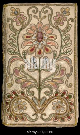 Una rilegatura ricamata del XVIII secolo, probabilmente italiana, realizzata in damasca di seta bianca. Questo legame adorna un Libro di preghiera comune e l'amministrazione dei Sacramenti, che si trova nella rara collezione di libri della Biblioteca Chester Beatty. Foto Stock