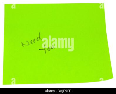 Scritto a mano ha bisogno di te in un libro verde Foto Stock