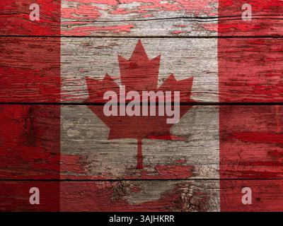 Bandiera canadese su vecchi pannelli rustici di legno con vernice rossa Foto Stock