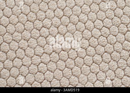 Moderno motivo a nido d'ape di colore beige per l'industria tessile Foto Stock