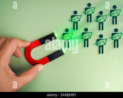 Concetti comunitari di responsabilità e conservazione ambientale. Persone che tengono una foglia, un'icona di volontariato, si muovono attratte dal magnete Foto Stock