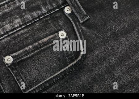 Jeans scuri con tasca Foto Stock
