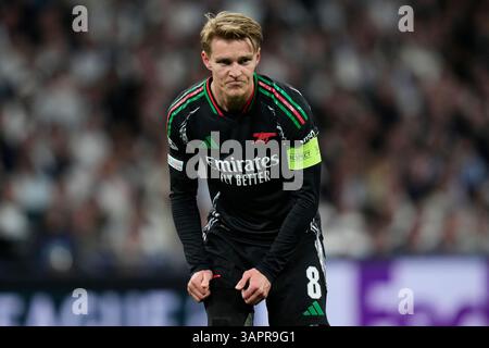 Madrid, Spagna. 16 aprile 2025. Martin Odegaard dell'Arsenal FC durante la partita di UEFA Champions League, quarti di finale, andata e ritorno, tra il Real Madrid e l'Arsenal FC ha giocato allo stadio Santiago Bernabeu il 16 aprile 2025 a Madrid in Spagna. (Foto di Cesar Cebolla/PRESSINPHOTO) credito: PRESSINPHOTO SPORTS AGENCY/Alamy Live News Foto Stock
