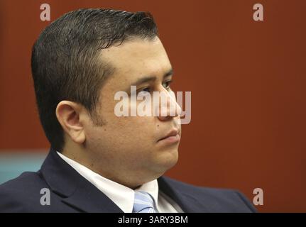 20 giugno 2013 - Sanford, Florida, Stati Uniti - George Zimmerman ascolta il suo avvocato difensivo Mark o'Mara interroga potenziali giurati per il suo processo nel tribunale di Seminole a Sanford, Florida, giovedì 20 giugno 2013. Zimmerman e' stato accusato di omicidio di secondo grado per la morte di Trayvon Martin nel 2012. (Immagine di credito: © Gary W. Green/MCT/ZUMAPRESS.com) Foto Stock
