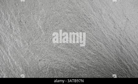 Sfondo grunge in granito di pietra naturale nero o grigio. Foto Stock