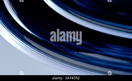 Questa immagine presenta una rappresentazione 3D dinamica di un attrattore con motivi vorticosi in più sfumature di blu, che creano un'accattivante visuale Foto Stock