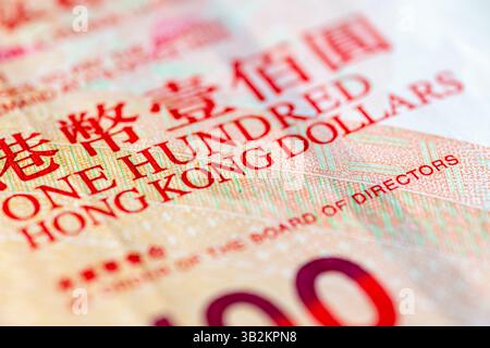 Primo piano macro di una banconota da cento dollari di Hong Kong. Foto Stock