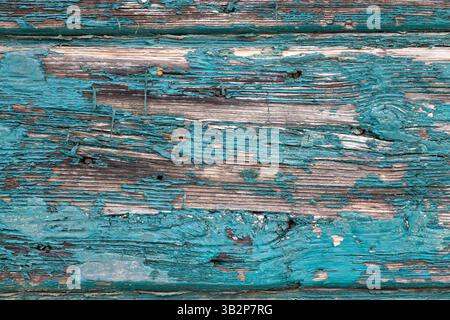 Struttura rustica in legno con vernice turchese sbucciata Foto Stock