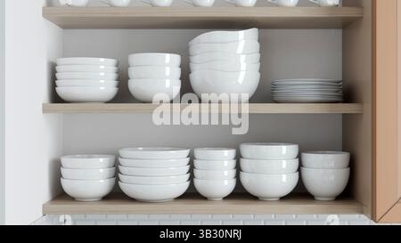 Le esclusive ciotole e piatti in ceramica bianca sono sistematicamente disposti su scaffali in legno in una cucina minimalista situata in una casa contemporanea. Desig Foto Stock