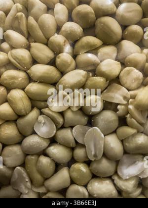 Vista ravvicinata delle arachidi come sfondo alimentare Foto Stock