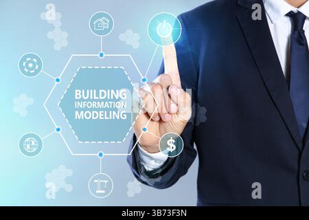 Modellazione delle informazioni di costruzione. Uomo che usa lo schermo virtuale con icone diverse, primo piano Foto Stock
