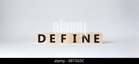 Definisci simbolo. La parola concettuale definisce i cubi di legno. Splendido sfondo bianco. Business e definizione del concetto. Copia spazio. Foto Stock