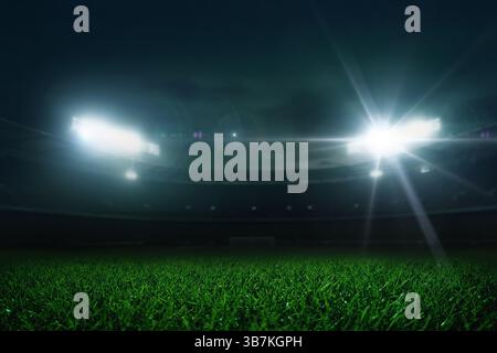 Moderno stadio di calcio con prato verde e riflettore. Background calcistico. Campioni di calcio. Vista grandangolare di Uno stadio di calcio sotto le luci, Perf Foto Stock