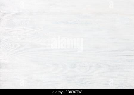 Tessitura shabby di legno della vecchia tavola. Sfondo di legno bianco. Vista dall'alto. Foto Stock