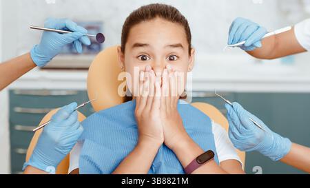 Odontoiatria per bambini, procedure mediche e igiene orale Foto Stock