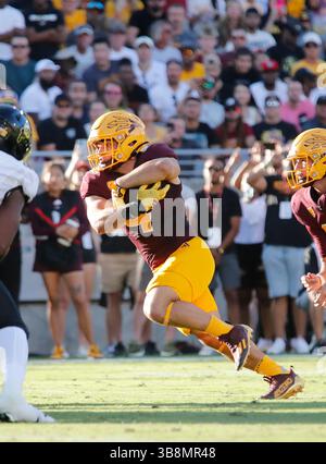 7 ottobre 2023: Il running back degli Arizona State Sun Devils Cameron Skattebo (4) corre per il secondo touchdown dell'ASU durante la partita di football NCAA tra l'Università del Colorado e l'Arizona State University al Mountain America Stadium di Tempe, Arizona. ..Michael Cazares/CSM. (Immagine credito: Foto Stock