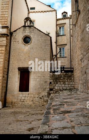 Cappella di San Luca a Dubrovnik, Croazia con ingresso in pietra scolpita. Foto Stock