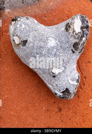 Di pietra a forma di cuore Foto Stock
