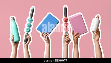 Molte mani con attrezzature sportive su sfondo rosa Foto Stock
