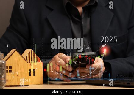 L'obiettivo dell'investimento immobiliare e dell'utilizzo della tecnologia per la gestione finanziaria e il processo decisionale informato. Pianificazione strategica e investimenti a lungo termine Foto Stock