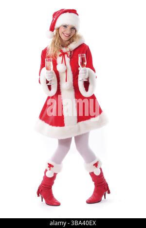 Allegra babbo natale con bicchieri di champagne. Messa a fuoco selettiva. Biglietto di auguri di Natale Foto Stock