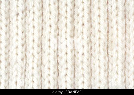 Sfondo dettagliato con trama in lana bianca. Modello di Unione con cuciture a nervatura. Foto Stock