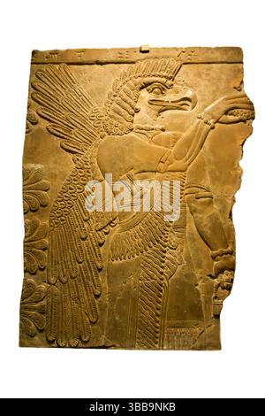 Bassorilievi di genie alate protettive dal palazzo di Ashurnasirpal a Nimrud. Ashmolean Museum, Oxford. Foto Stock