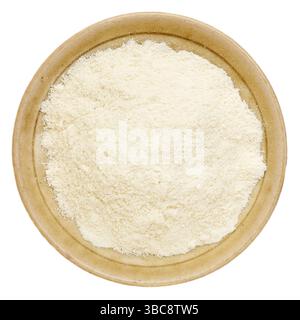 Proteine del siero di latte in polvere in un piccolo recipiente in ceramica Foto Stock