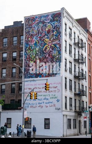 Angolo tra Thompson Street e Houston Street nel quartiere SOHO di New York City. Foto Stock