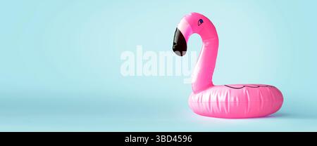 Anello rosa flamingo su sfondo blu Foto Stock