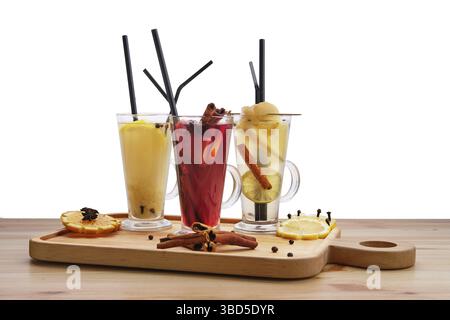 Bevande a base di frutta calda, lampone con arancia, lime con zenzero e pera con tè al lime Foto Stock