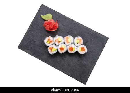 Panini con salmone e avocado su piastra di ardesia isolata su bianco Foto Stock