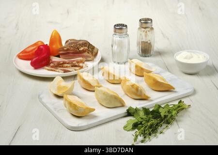 Gnocchi surgelati con pancetta e purè di patate Foto Stock