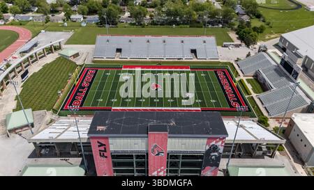 La vista aerea dello Scheumann Stadium di Muncie, Indiana, mostra una vivace arena di calcio, sede dei Ball State Cardinals, con 22.500 posti a sedere e la circostante California Foto Stock