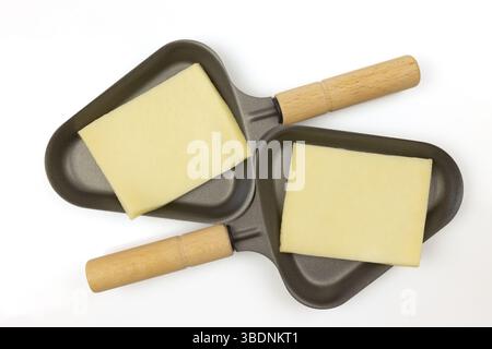 Formaggio di raclette in padelle tradizionali Foto Stock