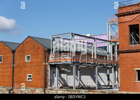 Radcliffe, sito di costruzione di collegamenti con hub civico, con telaio in acciaio a scheletro, a Greater manchester, regno unito Foto Stock
