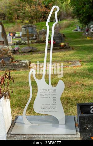 Lapide a forma di chitarra nel cimitero di Arrowtown, Arrowtown, Otago, nuova Zelanda Foto Stock