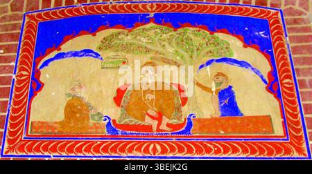 Questo affresco, fotografato da Zulfiqar Ali Kalhoro, raffigura "Baba Guru Nanak con Bhai Bala e Bhai Mardana". Si trova a Gulyana, Gujar Khan tehsil, provincia del Punjab, Pakistan. L'artista rimane sconosciuto. Foto Stock